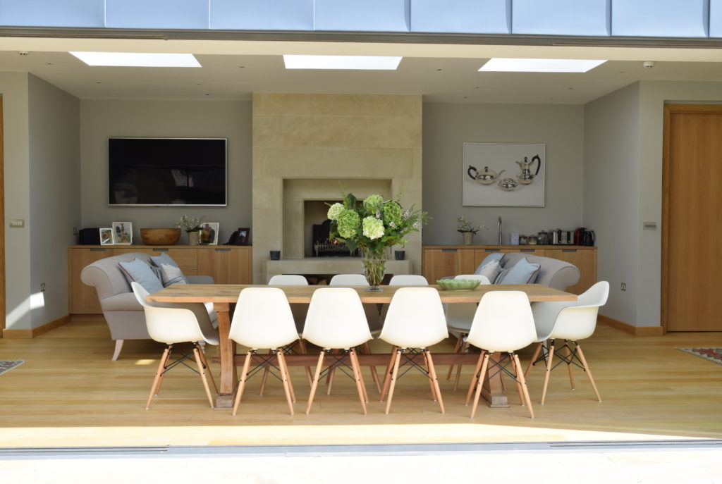 Bespoke oak cabinetry with zinc handles for a Pool House