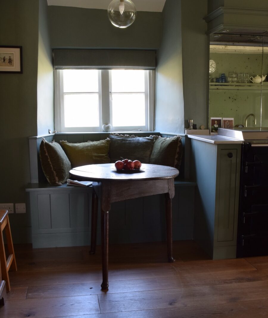 A kitchen dining table in a country house kitchen