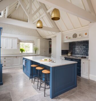 Bar stools nestled in a kitchen island creates an informal eating area