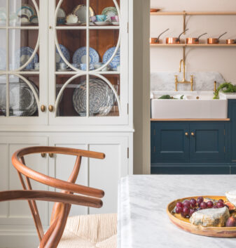 A view from a kitchen into a pantry