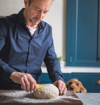 A professional chef using a bespoke kitchen 