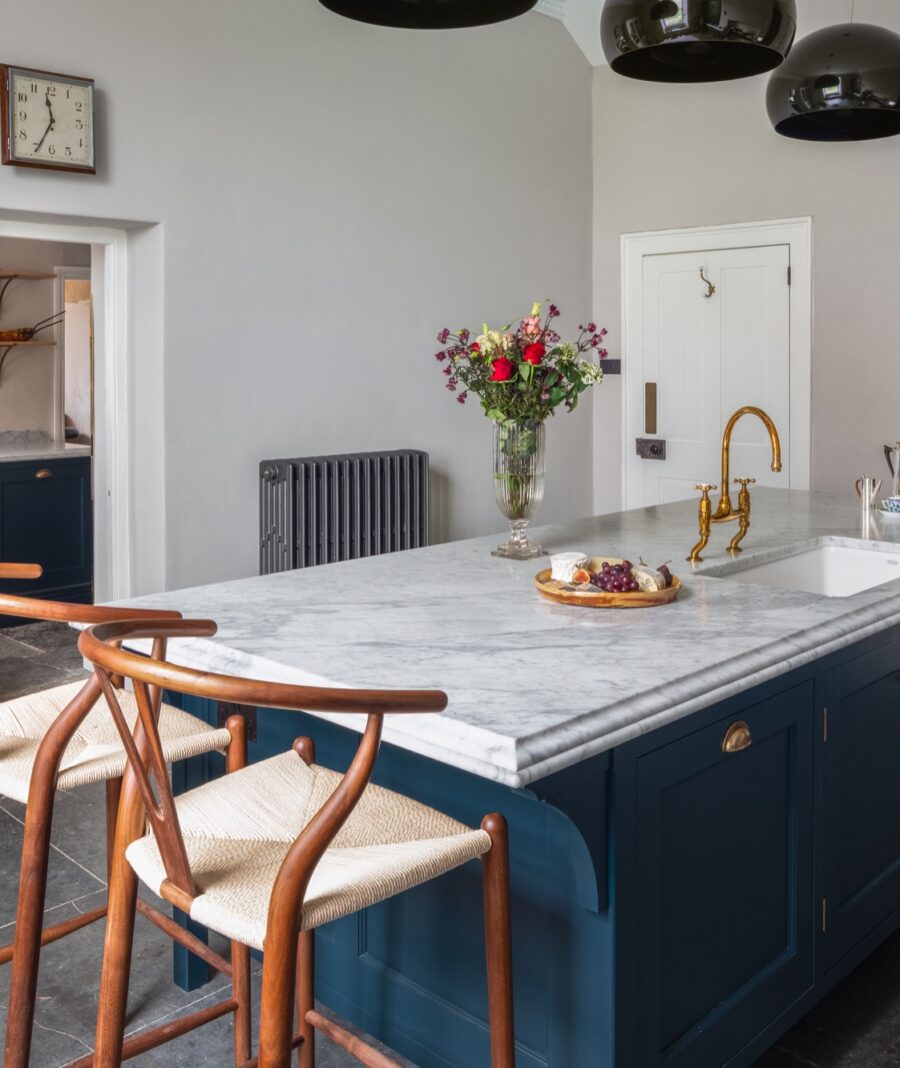 The kitchen has been moved to a light-filled room in this Georgian house