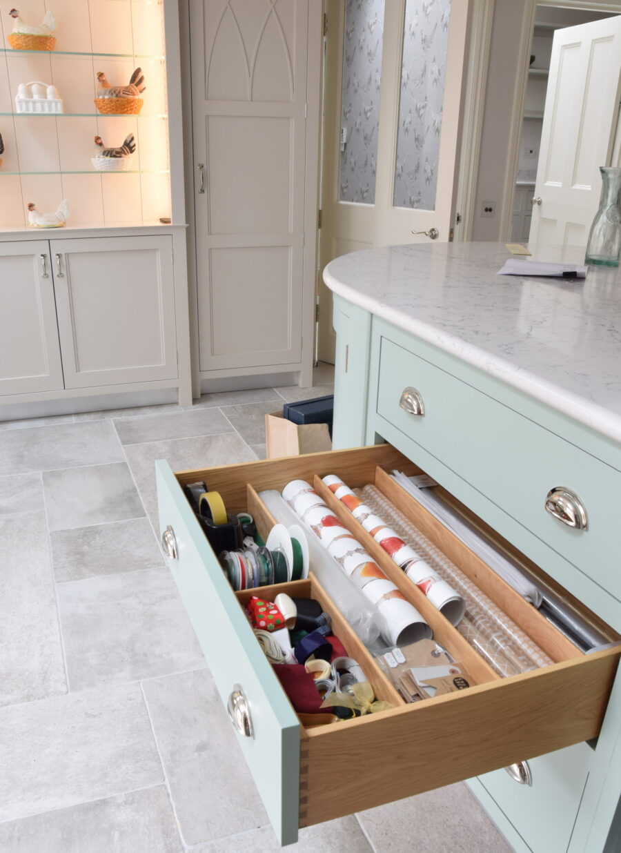 A bespoke wallpaper drawer incorporated in to bespoke kitchen cabinetry A bespoke wallpaper drawer incorporated in to bespoke kitchen cabinetry