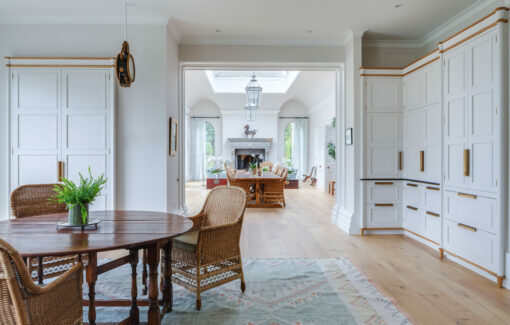 a large bespoke kitcen with very high ceilings