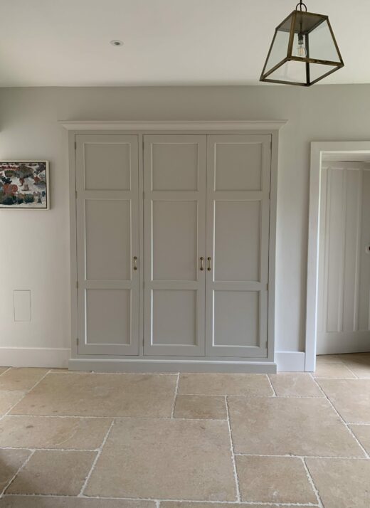 A set of three bootroom cabinet doors