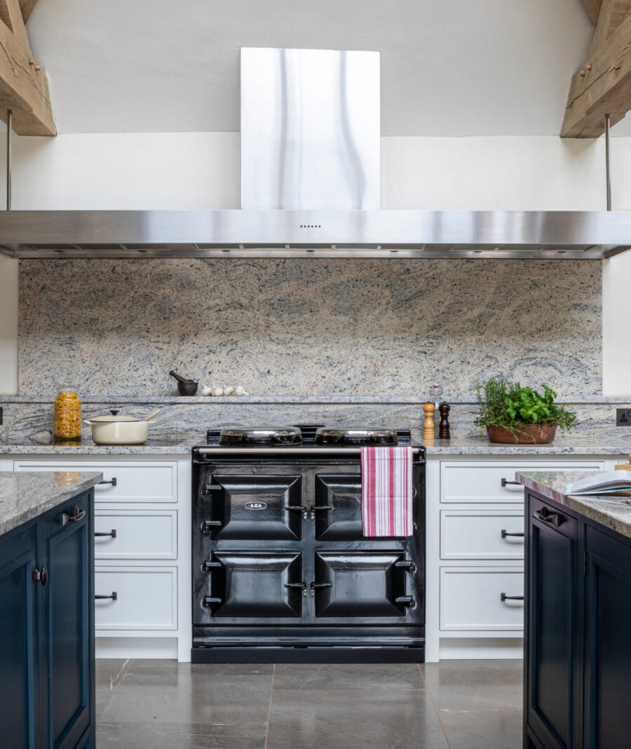 The AGA range cooker sits beneath and enormous bespoke Westin extractor hood The AGA range cooker sits beneath and enormous bespoke Westin extractor hood