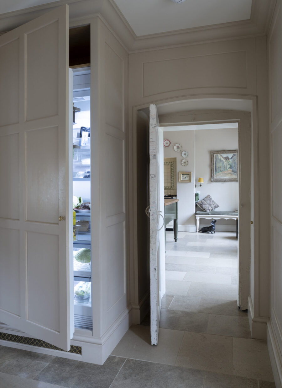 Tall kitchen cabinets conceal the Miele Mastercool fridge and freezer Tall kitchen cabinets conceal the Miele Mastercool fridge and freezer