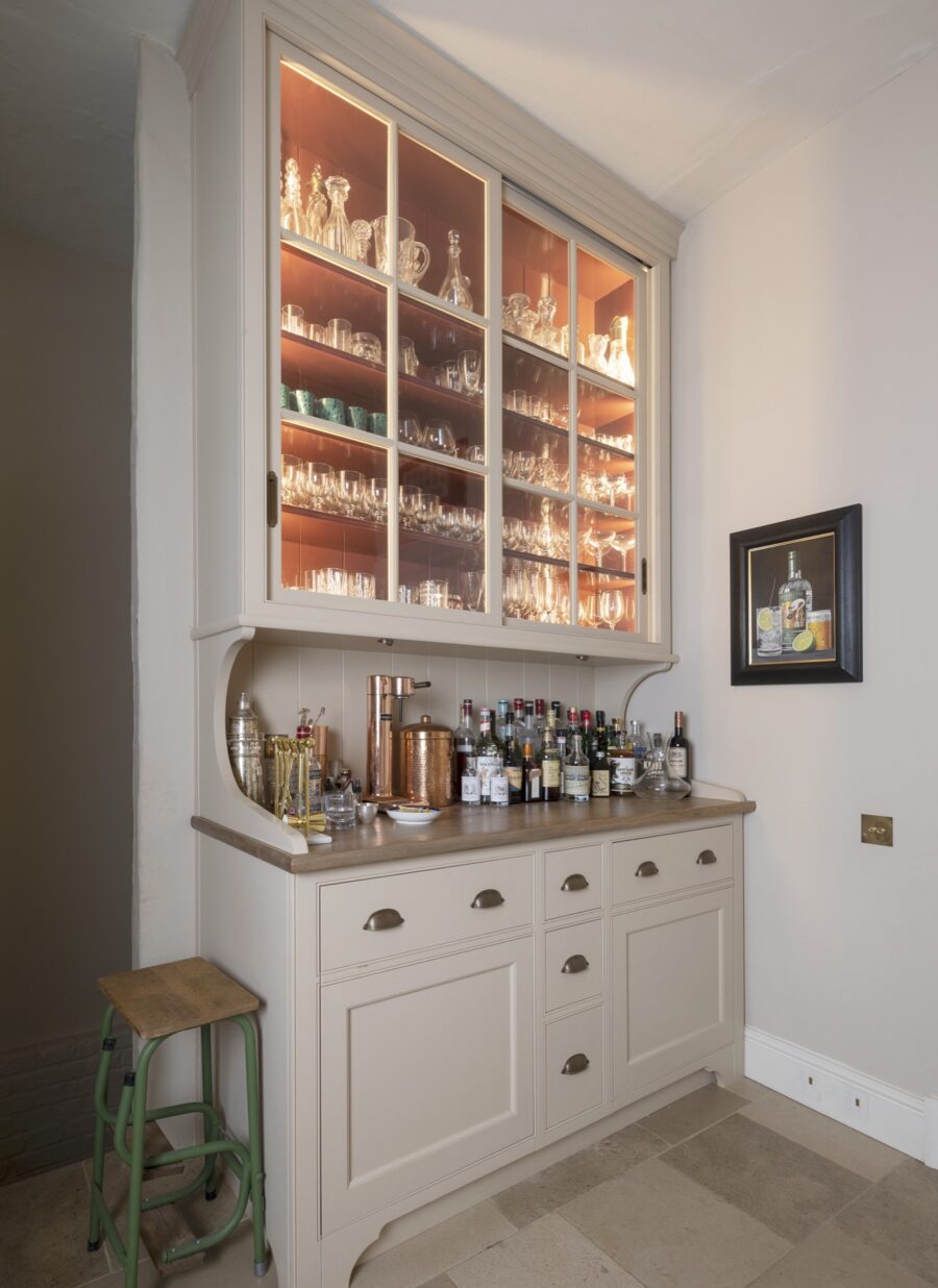 A glazed kitchen pantry dresser uses the full height of the room A glazed kitchen pantry dresser uses the full height of the room
