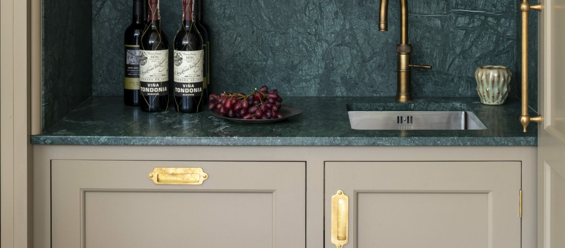 a bespoke bar with jade worktops