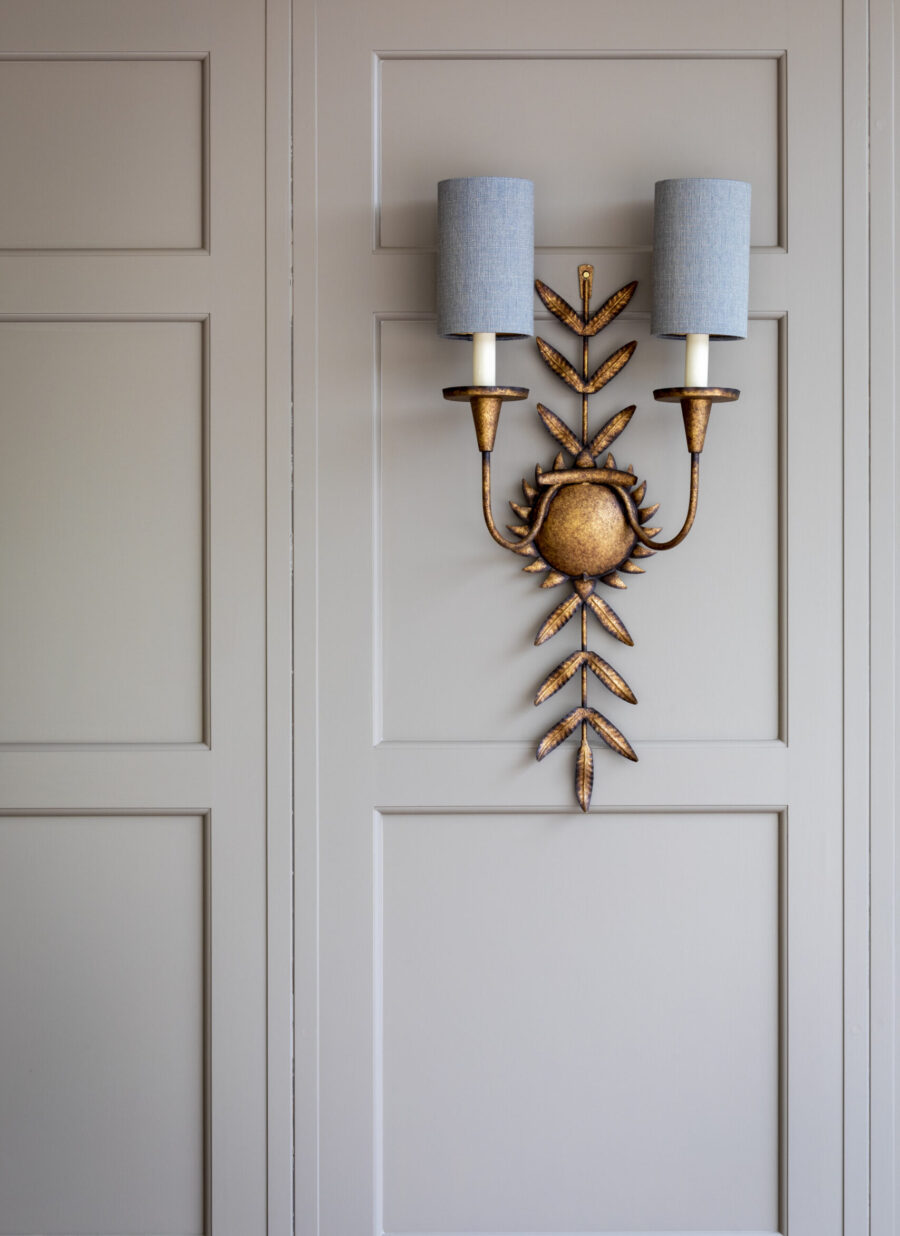 Bespoke wall panelling has been carried around the room Bespoke wall panelling has been carried around the room