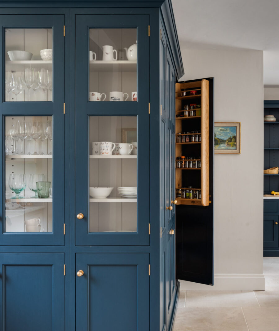 A bespoke blue hand painted glazed cabinet for crockery with larder cabinet A bespoke blue hand painted glazed cabinet for crockery with larder cabinet