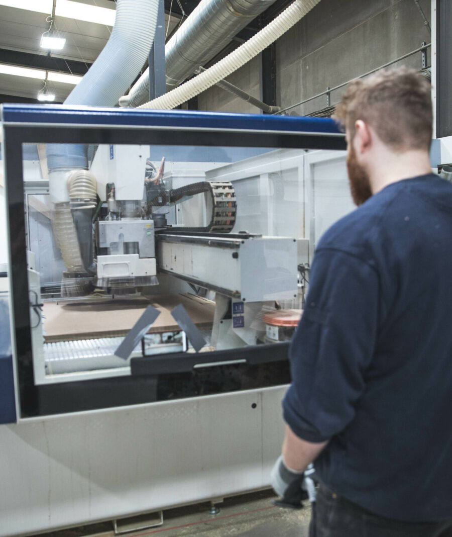 A Guild Anderson cabinet makers using the CNC machine
