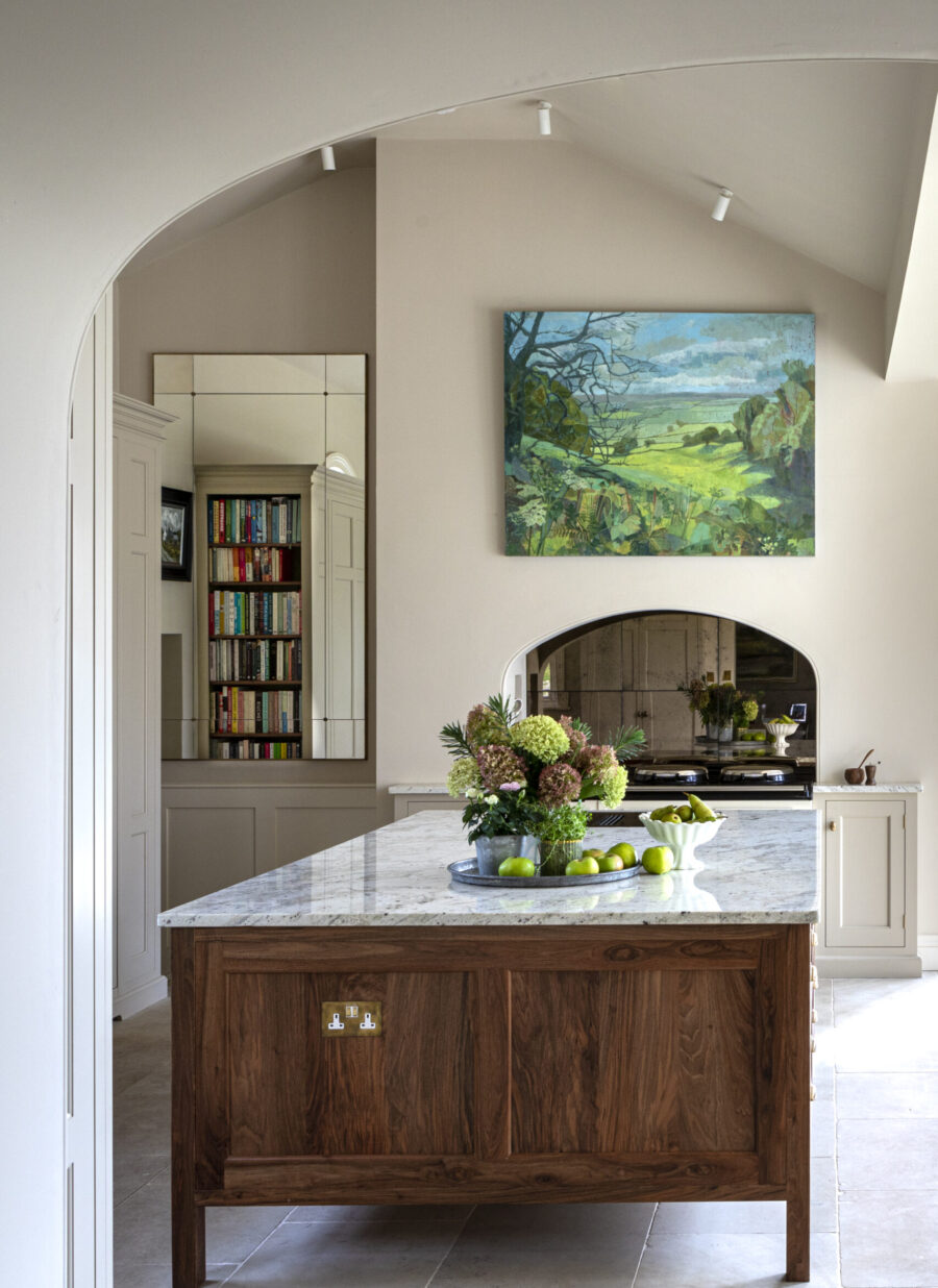 A large marble topped walnut kitchen island has been incorporated in to the Georgian house kitchen design A large marble topped walnut kitchen island has been incorporated in to the Georgian house kitchen design