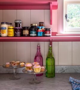 hand painted open shelving in bespoke walk-in pantry