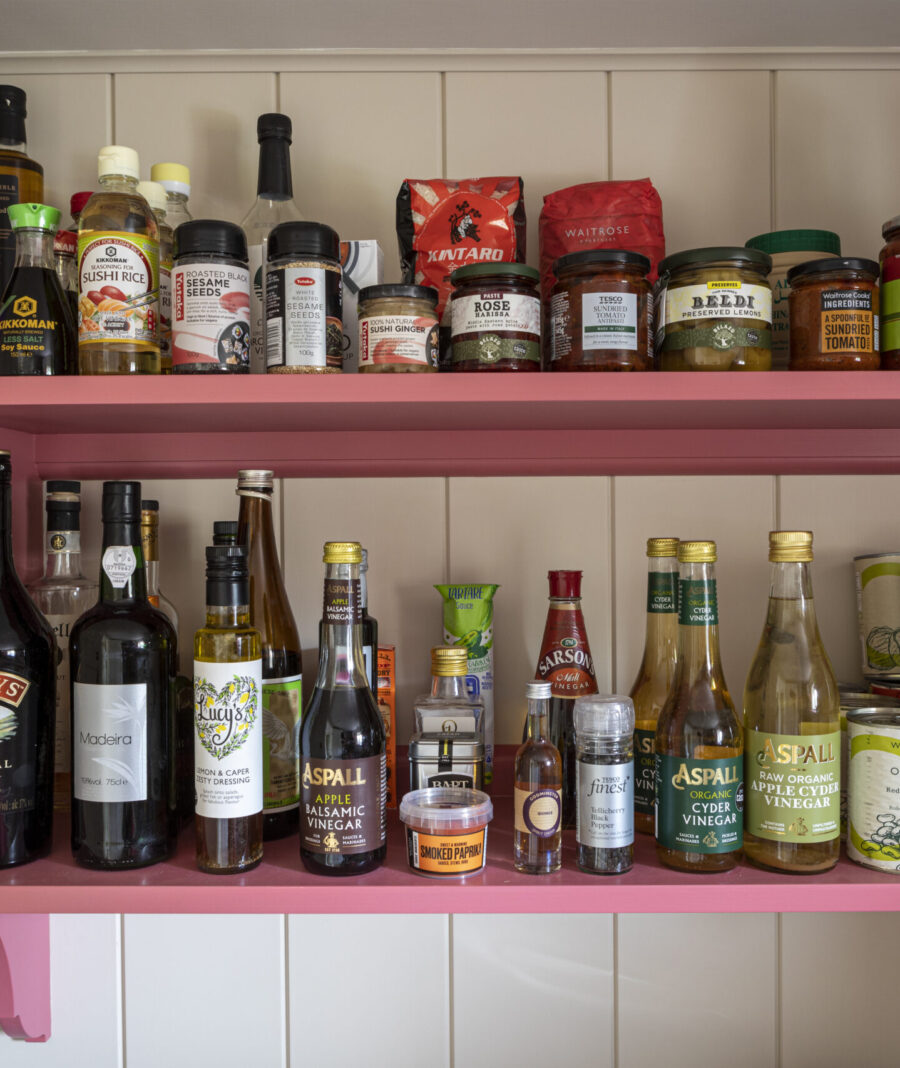 Open shelving, along with cabinetry, offers a variety of storage options Open shelving, along with cabinetry, offers a variety of storage options