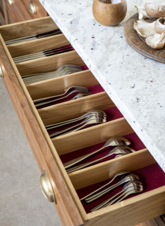 Kitchen cutlery drawers with red baize linings