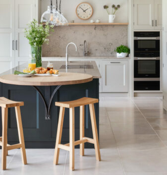 A bar area at the end of a bespoke kitchen island