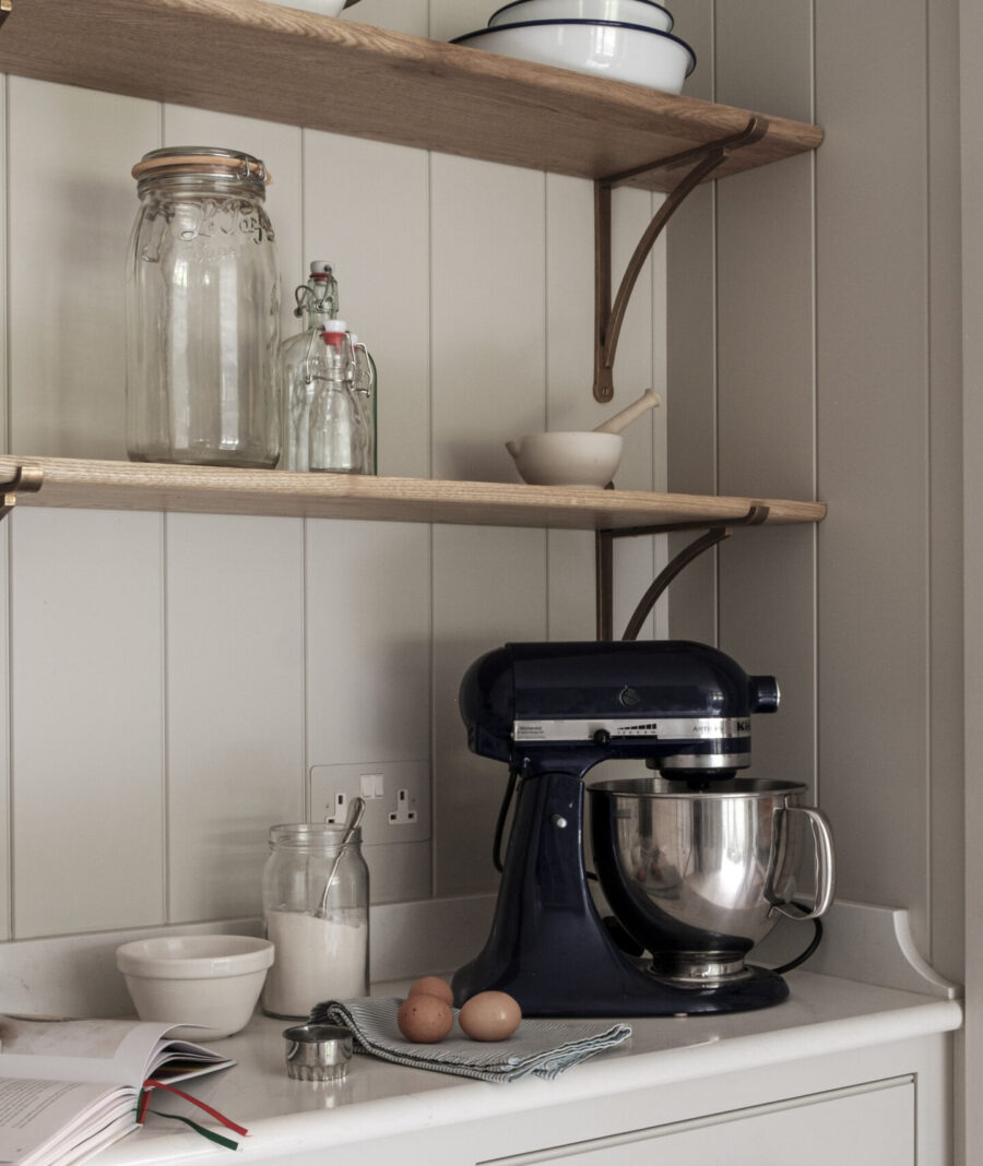 Bespoke pantry cabinets and opened shelves offer different storage options