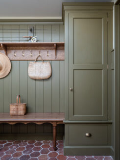 A green country house bootroom 