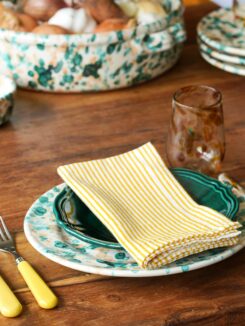 Montes & Clark - splatterware plate with tumbler, cutlery and napkin