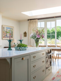A bespoke kitchen design for a Georgian house near Hungerford, Berkshire with a large marble topped kitchen island