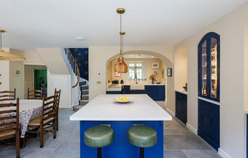 Blue hand painted Cornish kitchen with Barneby Gates wallpapers