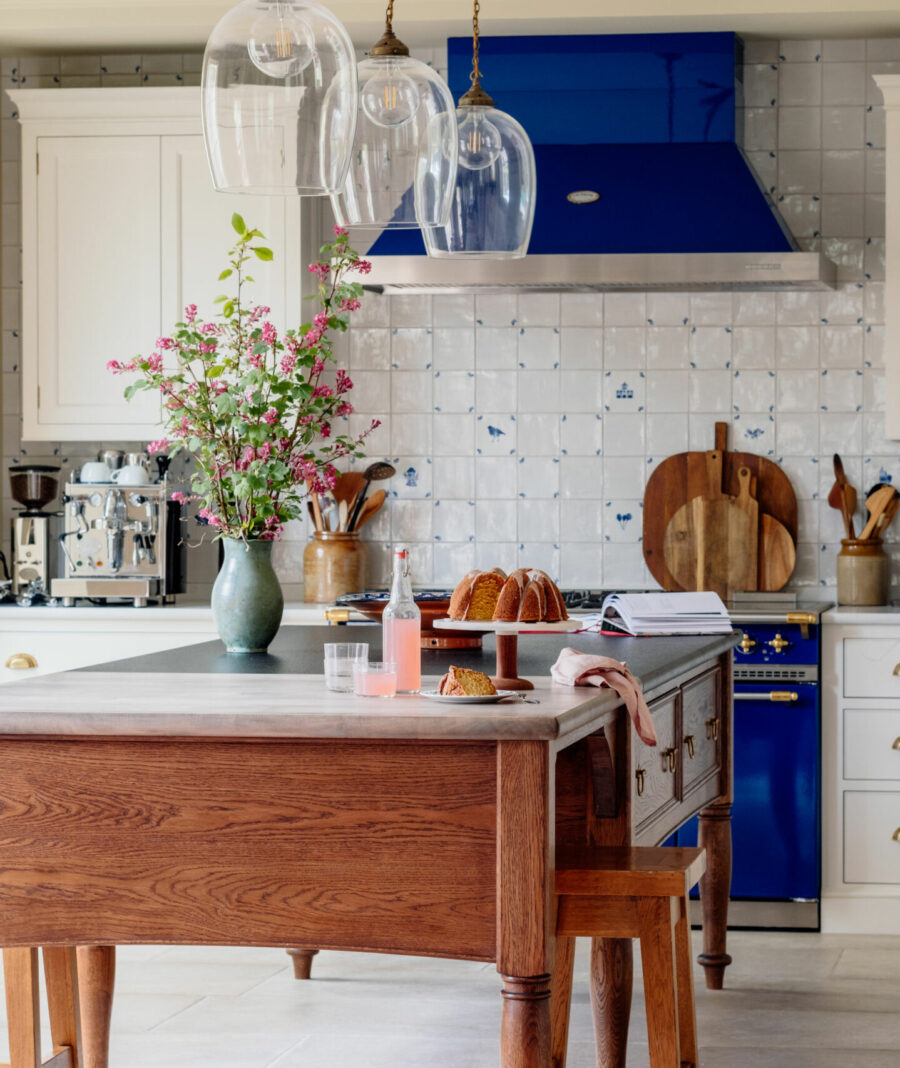 Kitchen extraction is central to this kitchen design with the cooker hood being the main feature above the range cooker