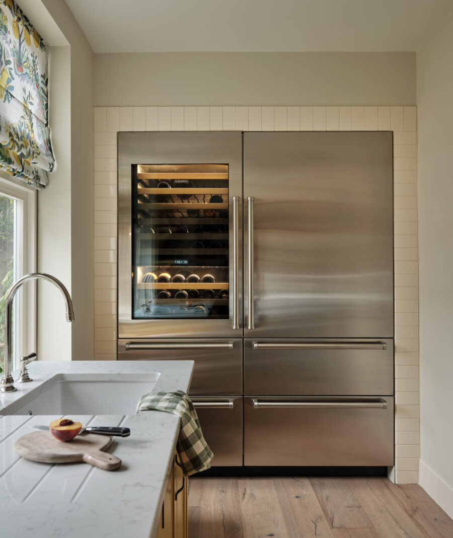 A Sub-Zero fridge, freezer wine cooler has been recessed in to a wall 