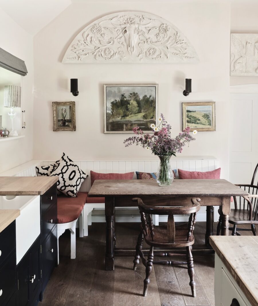 Coade sculptures adorn the wall of a kitchen