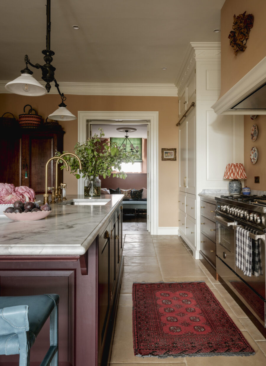 A kitchen island with stools