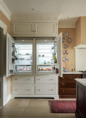 Bespoke cabinetry hides an integrated fridge Bespoke cabinetry hides an integrated fridge