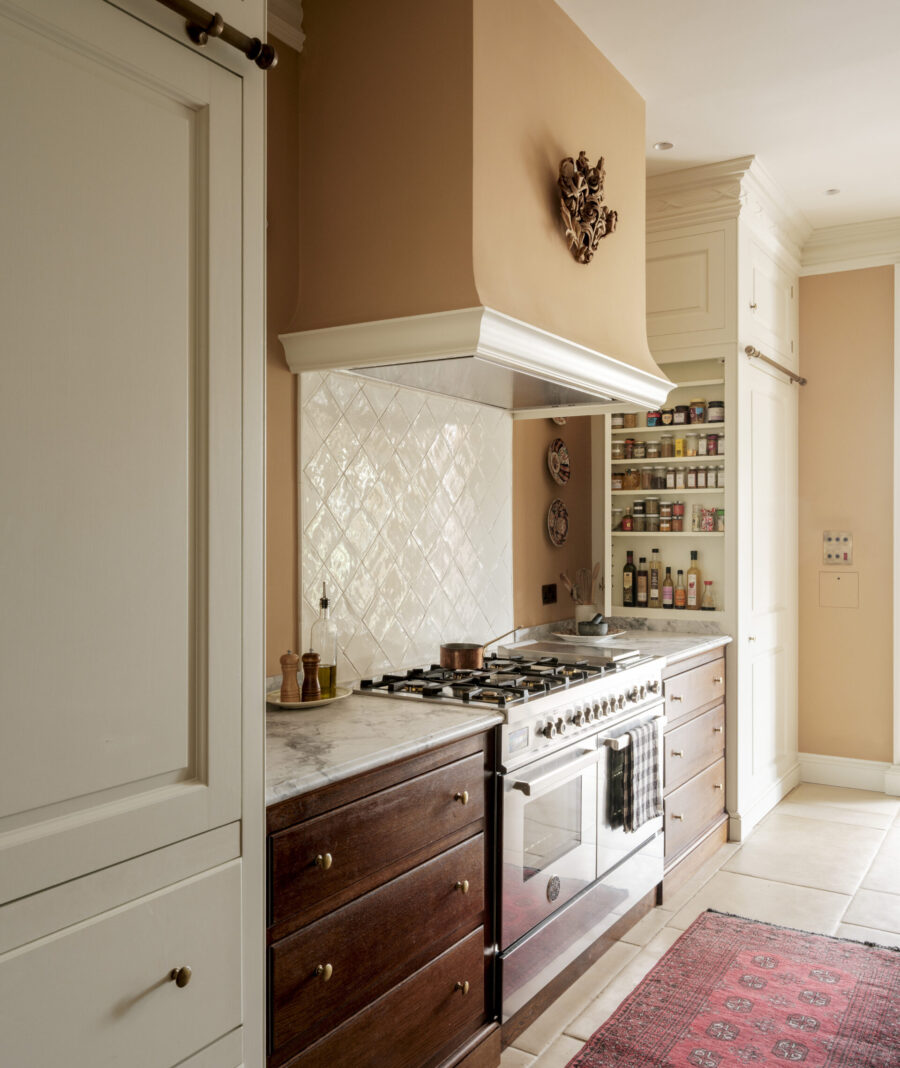 Range cooker by Italian brand Bertazzoni flanked by hand painted and oak cabinetry Range cooker by Italian brand Bertazzoni flanked by hand painted and oak cabinetry
