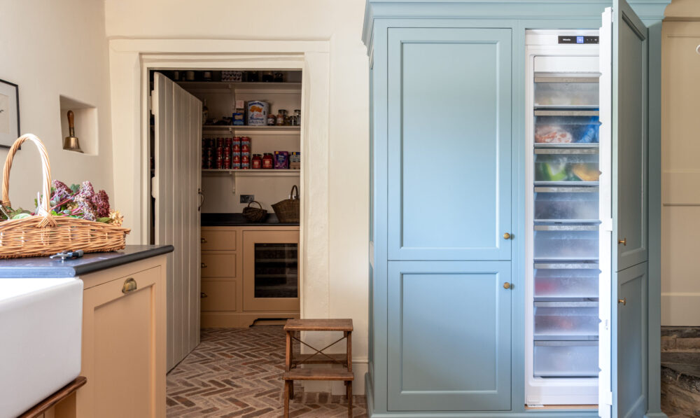 Somerset Farmhouse Kitchen Scullery with blue cabinet with fridge/freezer