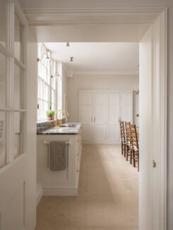 Long view of kitchen showing the sink run