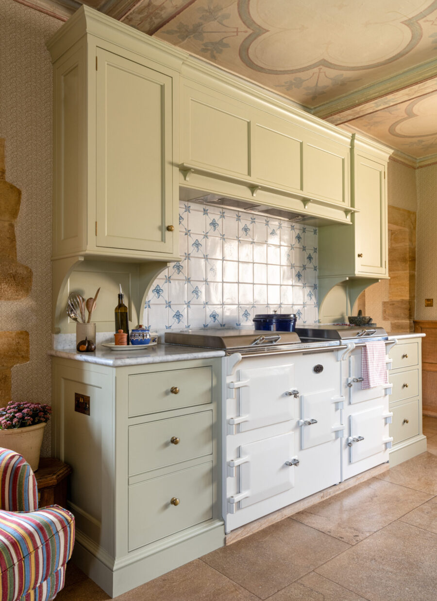 An Everhot range cooker framed by the joinery surround of a handmade kitchen An Everhot range cooker framed by the joinery surround of a handmade kitchen