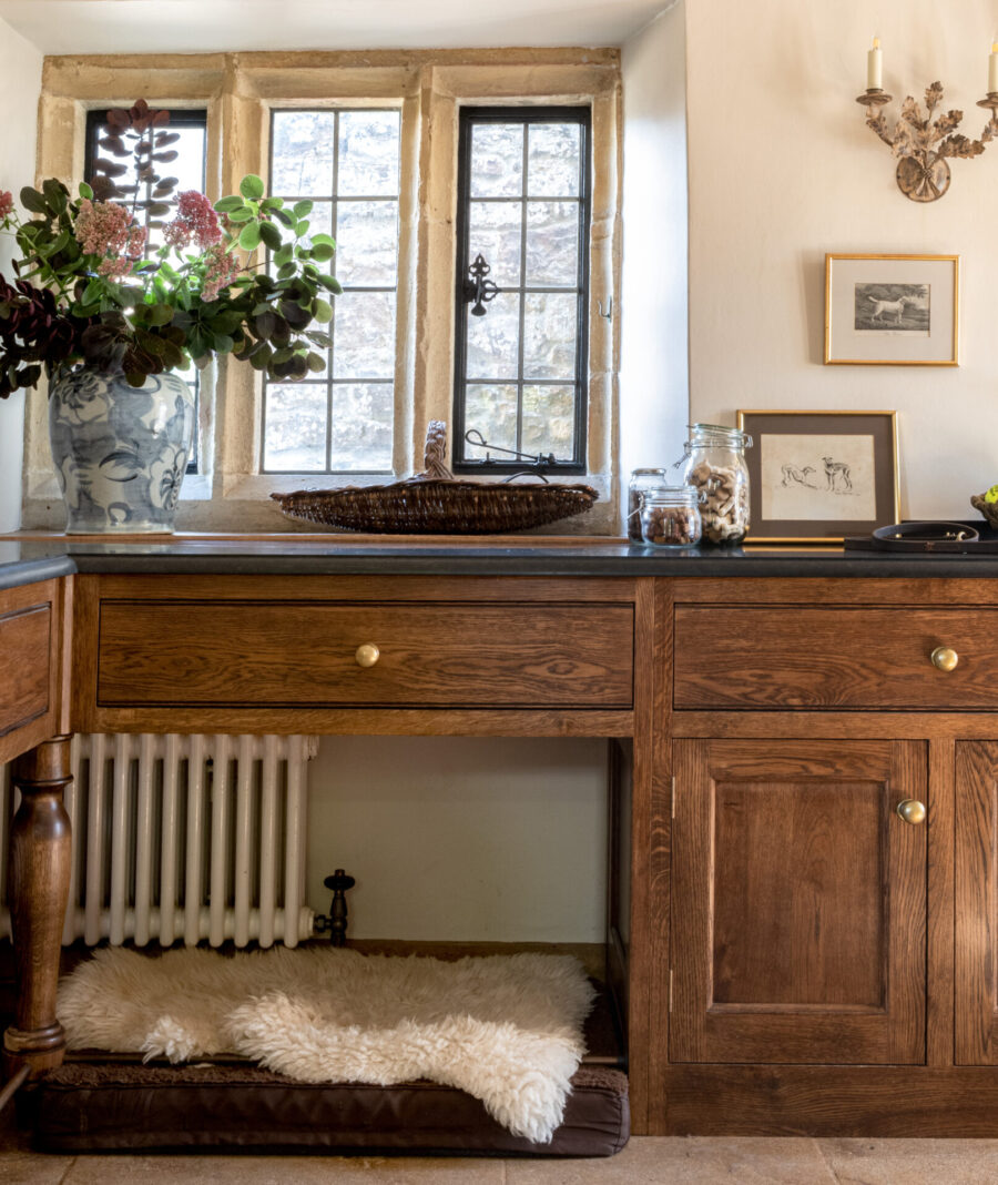 Hand finished oak cabinetry for a luxury dog room reflects the period of the house Hand finished oak cabinetry for a luxury dog room reflects the period of the house