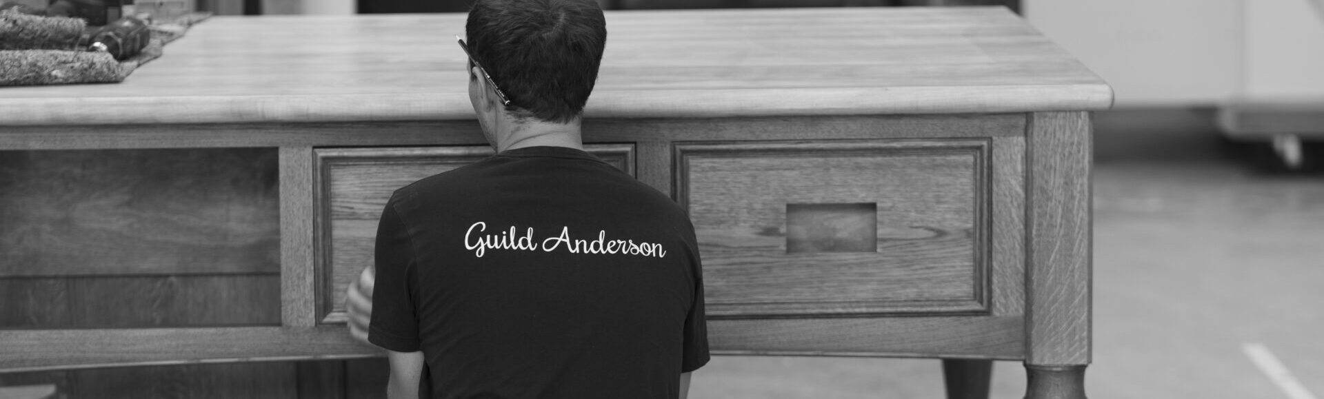 Guild Anderson workshop member completing a Cook's Table kitchen island