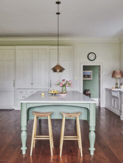 Edwardian country house kitchen with green Cook's Table kitchen island